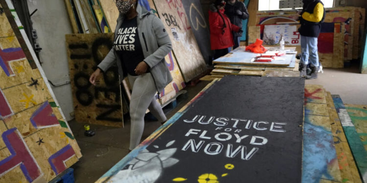Artists, activists rush to save Black Lives Matter murals