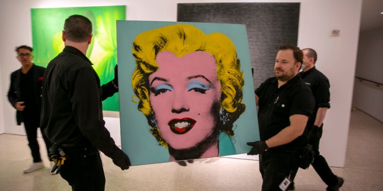 Warhol’s ‘Marilyn’ auction nabs $195M; most for US artist